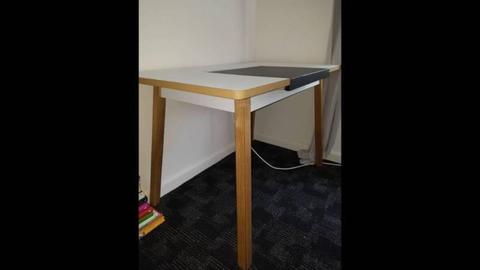 Desk with in-built draw