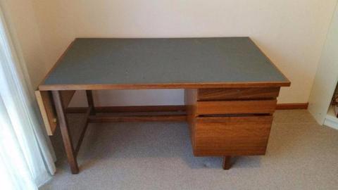 Solid timber desk with extendable fold out section