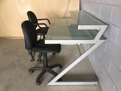 Glass office desk and two chairs
