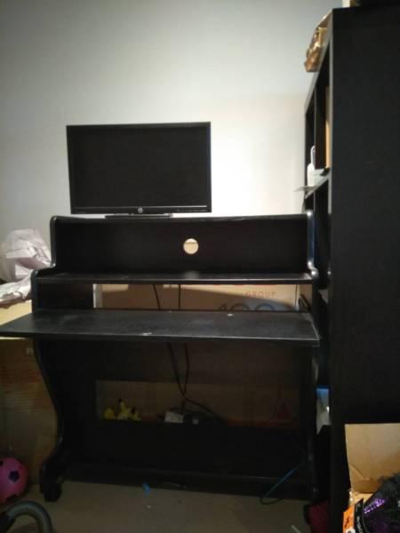 Black computer desk with moveable keyboard