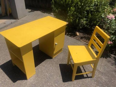 Small yellow desk with drawer and cupboard matching chair