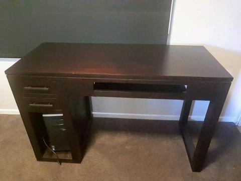 Solid dark wood office desk with pull out keyboard shelf