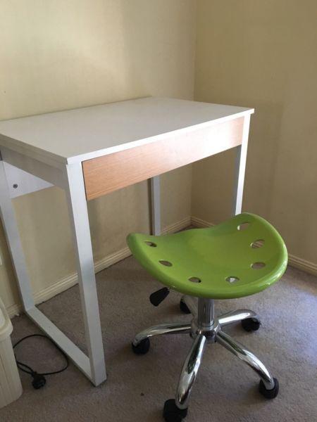 Small desks and swivel stools