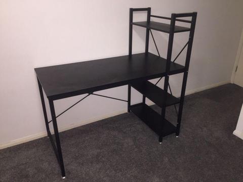 Black desk with shelves