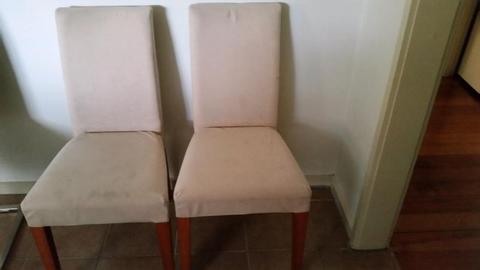 2 white suede chairs