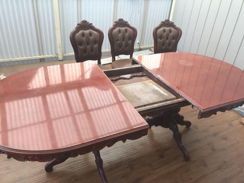 Sortino Timber dining table and 8 chairs in soft leather RRP $12,000