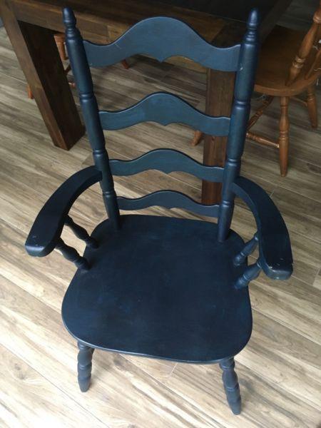 Antique wooden chair with arms