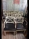 A Set of 12 Solid French Empire Chairs including 2 Carvers