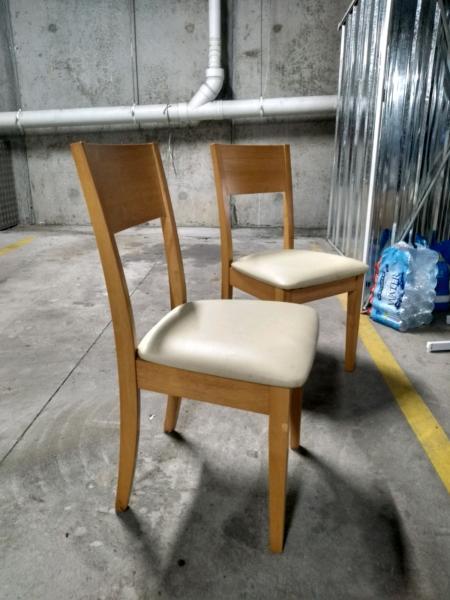 Two sturdy dining chairs