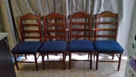 4 wood framed chairs in excellent condition