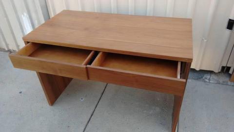 This is a great study desk with draws . Pick it up for a bargain