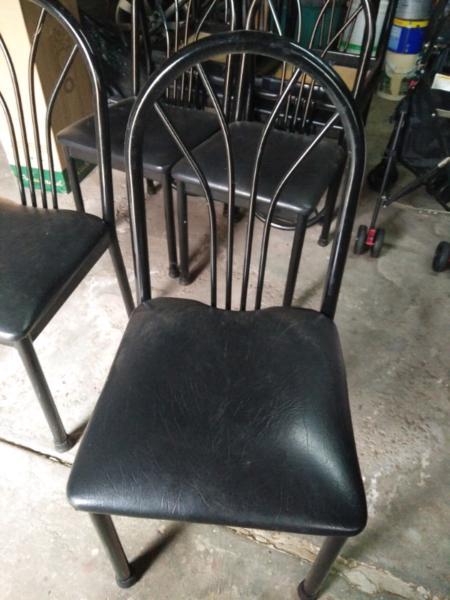 8 black chairs