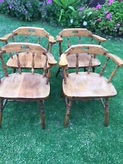 Four dining captain chairs