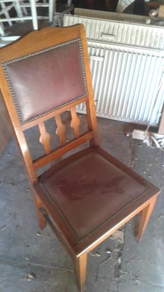Antique wooden leather ingrained dining chairs