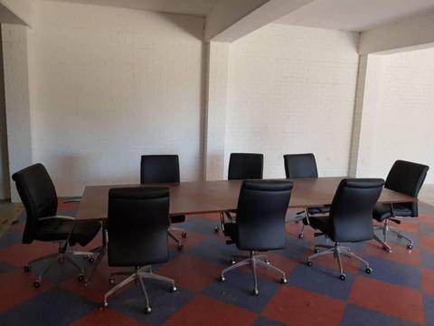 Large board meeting table and chairs