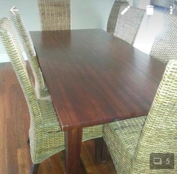 Timber table and 6 cane chairs