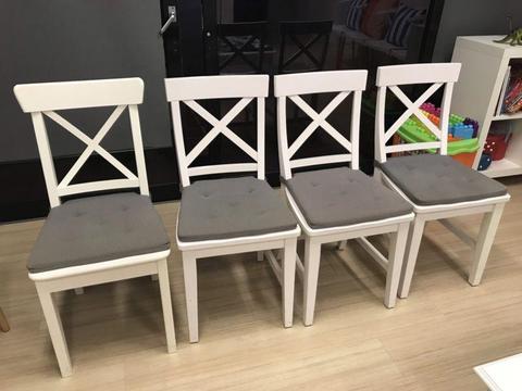 Crossed back dining chairs
