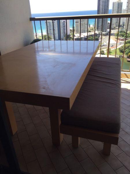 Solid timber dining table, light coloured wood, beach style