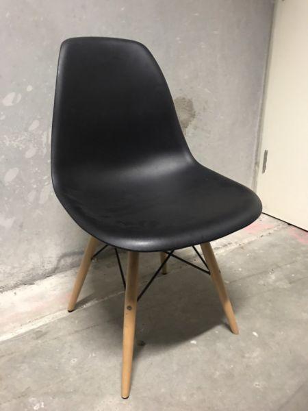 Designer chair with wooden legs