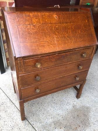 Old writing bureau from UK. Drop down writing desk with 3 drawe