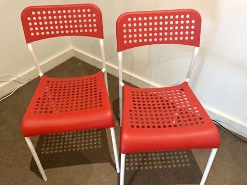 2 Red Ikea Adde chairs further reduced to only $8