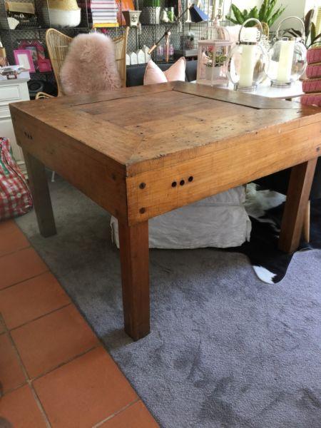 Old wooden butchers block table