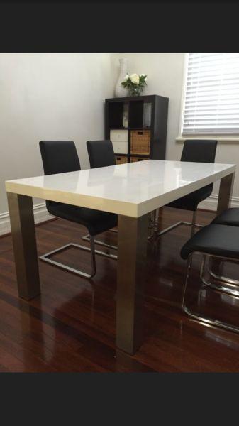 White dining table & 6 Black chairs