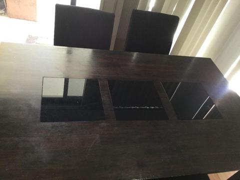 Dining table with chairs and buffet table