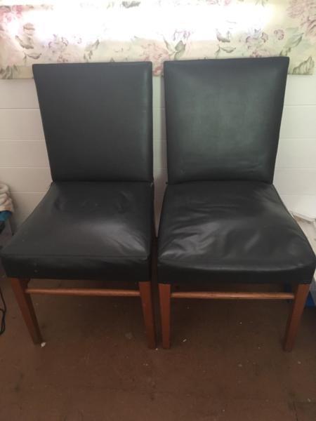 Two black dining chairs $15