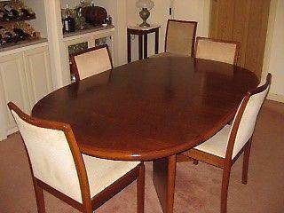 Dining room table and 8 upholstered chairs