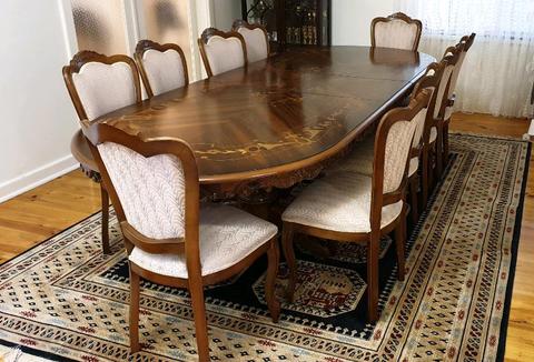 Solid wood dining table with decorative inlay, made in Italy
