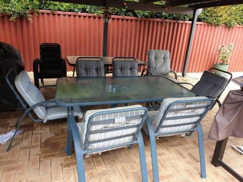 Outdoor glass tables and chairs