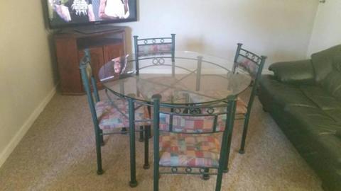 GLASS DINNING TABLE AND 4 CHAIRS