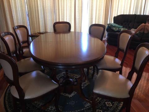 Dining extendable table and 8 chairs