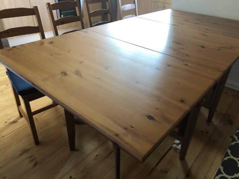 extendable wooden dinning table and chairs set