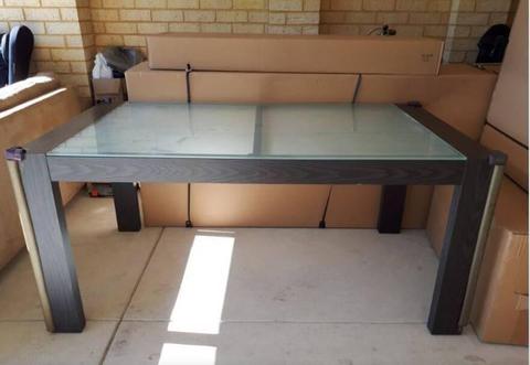 A glass dinning table