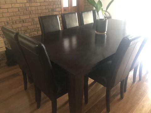 Solid dark wood dining table-10- 12 seater