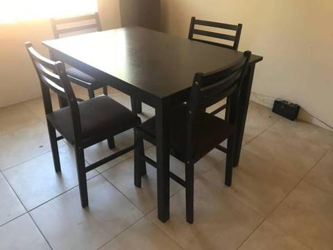 Dining table and chairs stained wood good condition