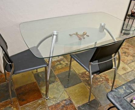 Glass Dining table and 6 chairs