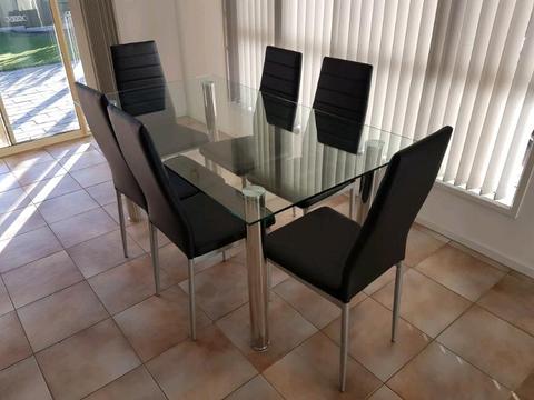 New Glass dining table and 6 chairs
