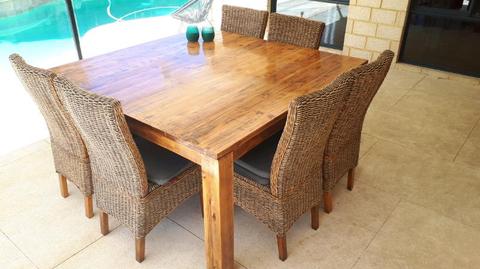 Dining table and 6 wicker chairs