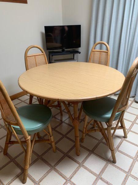 Wooden round table with 6 matching chairs