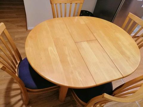 Extendable solid heavy pine dining table and chairs