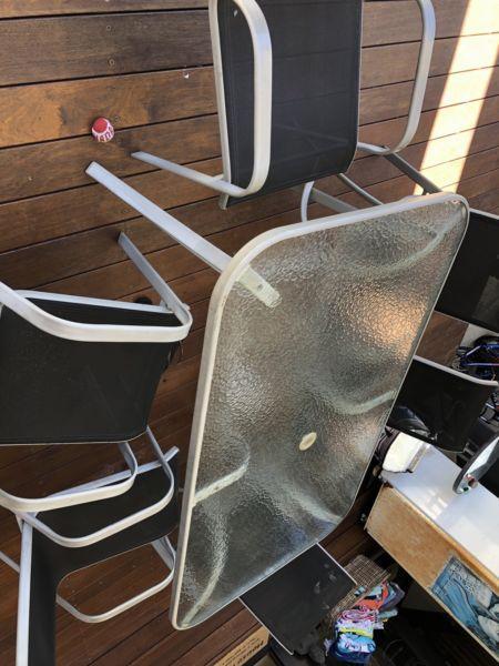 Outdoor glass table and chairs - great condition