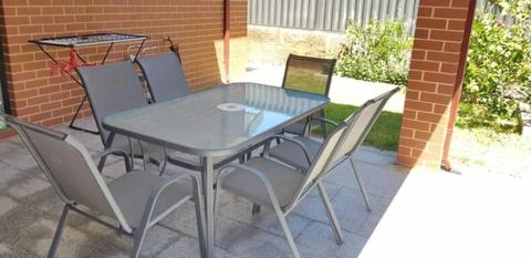 NEAR NEW OUTDOOR DINING TABLE WITH 6 CHAIRS