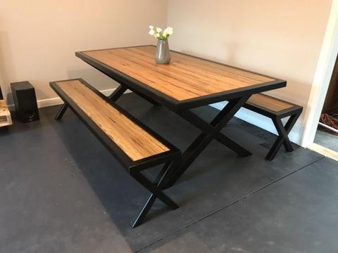 Recycled timber dining table with bench seats