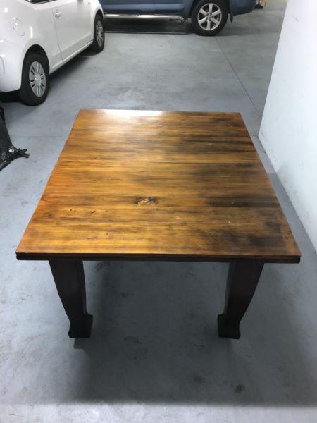 A Large Solid Oak Dining Table on Casters
