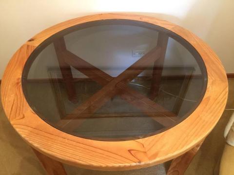 Dining Table with glass top supported by solid timber frame