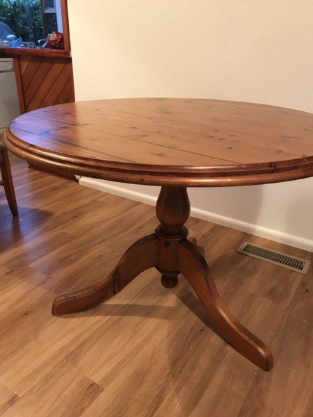Round timber dining table