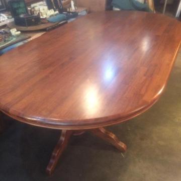 solid wood oval dining table and 6 solid wood chairs